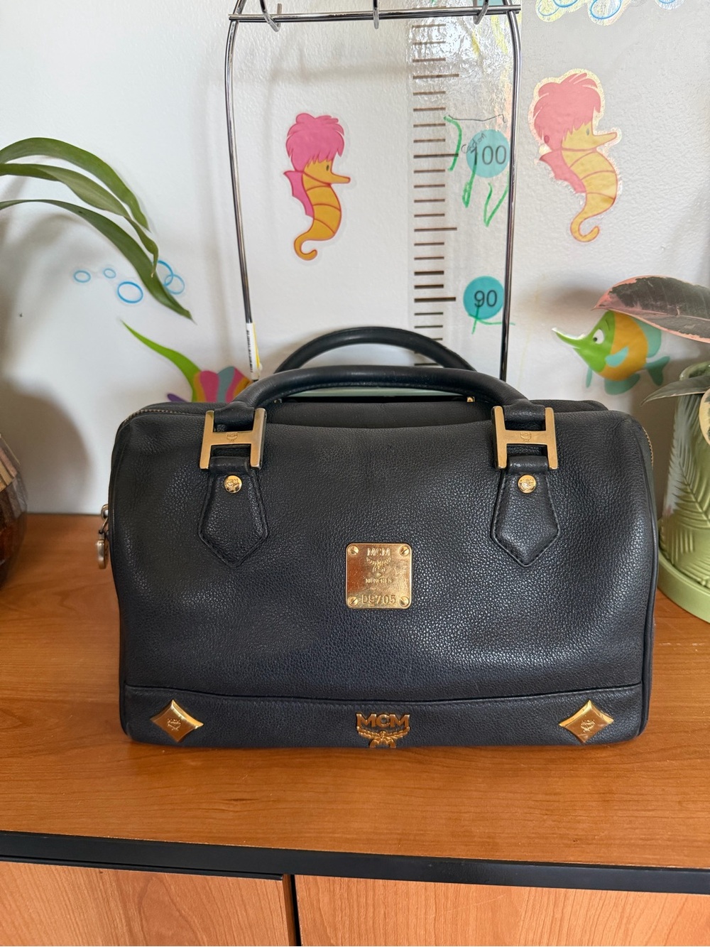 MCM Black Leather Satchel with Gold Hardware Accents